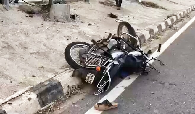 A view of a bike damaged in a road accident which killed seven people, on Hoskote-Dabaspet National Highway, in Bengaluru on Friday. (ANI Video Grab) A view of a bike damaged in a road accident which killed seven people, on Hoskote-Dabaspet National Highway, in Bengaluru on Friday. (ANI Video Grab)