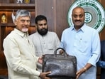 Chief minister N Chandrababu Naidu, left, deputy chief minister Pawan Kalyan, center, hold a bag containing budget documents for Andhra Pradesh's 2026-27 financial year. (@APDeputyCMO) Chief minister N Chandrababu Naidu, left, deputy chief minister Pawan Kalyan, center, hold a bag containing budget documents for Andhra Pradesh's 2026-27 financial year. (@APDeputyCMO)
