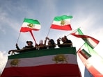Demonstrators take part in a march in support of the people of Iran by members of the American-Iranian community in Los Angeles on February 14, 2026. The demonstration comes after the bloody crackdown on protesters last month.