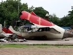 Wreckage of the Air India Boeing 787-8 Dreamliner plane sits on the open ground, outside Sardar Vallabhbhai Patel International Airport, where it took off and crashed nearby shortly afterwards, in Ahmedabad.