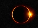 A ring is seen in the sky, which temporarily darkened as the Moon passes between the Sun and Earth. 