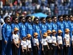 Afghanistan’s team during their national anthem before the start of the T20 Cricket World Cup group stage match against United Arab Emirates on Monday. (AFP)