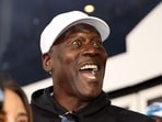 Michael Jordan, NBA Hall of Famer and co-owner of 23XI Racing reacts in victory lane after Tyler Reddick at Daytona 500.