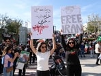 Demonstrators take part in a march in support of the people of Iran by members of the American-Iranian community in Los Angeles.