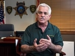 Pima County Sheriff Chris Nanos faces criticism as Nancy Guthrie missing case probe drags on.