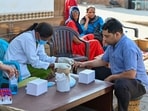 A team from the health department conducts rapid tests for infections at Chayansa village (also spelt  Chhainsa) in Palwal district.