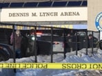 Police and ATF agents stand near the Lynch Arena in Pawtucket, R.I., after a shooting at the ice rink, Monday, Feb. 16, 2026.