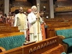 Before the new Parliament building’s inauguration on May 28, 2023, Prime Minister Narendra Modi, who is seen carrying the Sengol, attended a ‘havan’ and ‘sarv-dharma’ prayers, in which he was accompanied by Lok Sabha Speaker Om Birla and ministers. The Sengol, which is the symbol of transfer of power from the British in 1947, was placed in the Lok Sabha. (HT file photo)