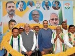 Bihar Congress president Rajesh Ram, along with party Bihar in-charge Krishna Allavaru, garlands Rashtriya Lok Morcha leader Jitendra Nath Patel and others during Milan Samaroh at Sadaquat Ashram in Patna on Tuesday. (Santosh Kumar/HT)