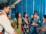 Dr Borade, health chief of the PMC (in blue saree) and team during visit to MMIT. (HT PHOTO)