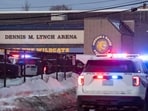 Police stand outside the perimeter they created around the Dennis M. Lynch Arena where a shooting occurred earlier today in Pawtucket, Rhode Island, on February 16, 2026. (Photo by Joseph Prezioso / AFP)