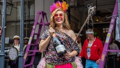 Attendees march during the annual Krewe of Bacchus parade during the Mardi Gras season on Sunday, Feb. 15, 2026, in New Orleans. (Photo by Amy Harris/Invision/AP) (Amy Harris/Invision/AP) Attendees march during the annual Krewe of Bacchus parade during the Mardi Gras season on Sunday, Feb. 15, 2026, in New Orleans. (Photo by Amy Harris/Invision/AP) (Amy Harris/Invision/AP)