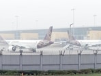 Aircraft parked amid dense fog at IGI airport in New Delhi. (ANI)