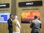 Sarvam AI co-founder Pratyush Kumar and Prime Minister Narendra Modi at the company's pavilion at the India AI Summit in New Delhi on Monday, 16 February 2026.
