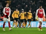 Wolverhampton Wanderers celebrate their equaliser against Arsenal.