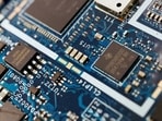 FILE PHOTO: Semiconductor chips are seen on a circuit board of a computer in this illustration picture (REUTERS) FILE PHOTO: Semiconductor chips are seen on a circuit board of a computer in this illustration picture (REUTERS)
