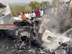Firefighters at the site after an aircraft carrying Maharashtra deputy chief minister Ajit Pawar crashed during landing at Baramati in Pune district. (PTI FILE)