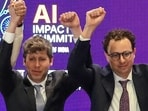 There was no handclasp between Altman and Amodei, who both raised their fists.