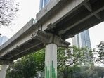 On February 14, a parapet wall slab from the under-construction Metro 4 viaduct fell onto the LBS Road in Mulund West, crushing an autorickshaw and a car. (Raju Shinde/HT Photo) On February 14, a parapet wall slab from the under-construction Metro 4 viaduct fell onto the LBS Road in Mulund West, crushing an autorickshaw and a car. (Raju Shinde/HT Photo)