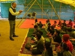 Roshan Kumar Rawat during his classes. (Parveen Kumar/Hindustan Times)