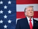 US President Donald Trump looks on during an event with members of the military and their families at Fort Bragg, North Carolina on February 13, 2026.