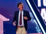 Tucker Carlson claimed he was detained by Israeli authorities, but his version of events was challenged by the US ambassador to Israel.