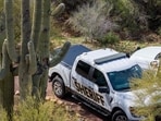TUCSON, ARIZONA - FEBRUARY 17: In an aerial view, Pima County Sheriff officers gather on Nancy Guthrie's property on February 17, 2026 in Tucson, Arizona. (Photo by Brandon Bell / GETTY IMAGES NORTH AMERICA / Getty Images via AFP)