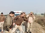 The cops said that the accused has been taken into custody The cops said that the accused has been taken into custody