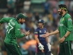 Salman Ali Agha and Usman Tariq celebrate.