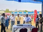 Dhanbad deputy commissioner-cum-district election officer (municipal) Aditya Ranjan and SSP Prabhat Kumar jointly inspect the dispatch and receiving centres in Dhanbad on Friday (HT PHOTO)