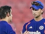 Indian team head coach Gautam Gambhir in conversation with Abhishek Sharma during a practice session in Ahmedabad on Friday. (PTI)