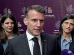 French President Emmanuel Macron speaks to the media during the ongoing AI Impact Summit 2026, in New Delhi on Thursday.