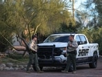 Pima County Sheriff's deputies are seen in front of Nancy Guthrie's residence during a shift change on February 19, 2026, in Tucson, Arizona. 
