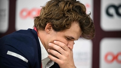 Magnus Carlsen was held to a draw against a 14-year-old CM. (AFP)