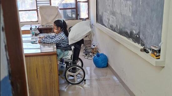 Kanishka Bisht at her exam centre, Government Senior Secondary School, Modern Complex, in Sector 13, Manimajra, on Friday. (HT Photo)