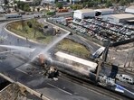 A drone view shows firefighters working at the site of a deadly explosion in Chile