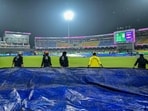 Ground staff cover the field as rain delayed the start of the T20 World Cup Super Eight match between Pakistan and New Zealand in Colombo