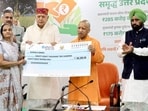 Chief minister Yogi Adityanath during a programme at his official residence in Lucknow on Saturday. (HT)