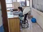 Kanishka Bisht at her exam centre, Government Senior Secondary School, Modern Complex, in Sector 13, Manimajra, on Friday. (HT Photo)