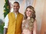Sophie Shine, fiancée of Indian cricketer Shikhar Dhawan, looks elegant in a red and gold traditional lehenga. (Instagram/ sophieshine93)