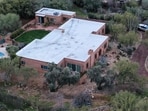 In an aerial view, the home of Nancy Guthrie is seen on February 20, 2026, in Tucson, Arizona. 