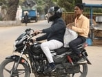 UP Board answer sheets being taken to collection centres in Prayagraj without the mandatory security cover after the first-shift exam on Friday. (HT)