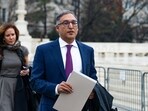 Attorney Neal Katyal, center, and Sara Albrecht, chair of the Liberty Justice Center, arrive for an interview outside of the US Supreme Court in Washington, DC, on Friday, Attorney Neal Katyal, center, and Sara Albrecht, chair of the Liberty Justice Center, arrive for an interview outside of the US Supreme Court in Washington, DC, on Friday,