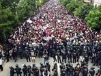 People stage a massive protest against the government’s decision to block several social media platforms, outside the parliament building, in Kathmandu