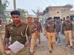 Mathura police carrying out a search for cyber frauds in a village early on February 22. (Sourced)