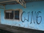 FILE - The letters "CJNG" for the group's formal name, Jalisco New Generation Cartel, covers the facade of an abandoned home in El Limoncito, in the Michoacan state of Mexico.