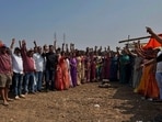 Thane, India - February -22, 2026: The residentsof Mogharpada, whose lands have been acquired for the Metro 4 (WadalaÐKasarvadavali) car shed in Thane, staged a protest on Sunday demandingimmediate disbursal of compensation and allotment of alternative land in lieuof the acquired plots. The protesters warned that they would block traffic onThane Ghodbunder Road and would not allow authorities to take possession of theland if their demands are not addressed at the earliest. ,in Thane ,in Mumbai, India, on, Sunday, February -22, 2026. ( Praful Gangurde / HT Photo) Thane, India - February -22, 2026: The residentsof Mogharpada, whose lands have been acquired for the Metro 4 (WadalaÐKasarvadavali) car shed in Thane, staged a protest on Sunday demandingimmediate disbursal of compensation and allotment of alternative land in lieuof the acquired plots. The protesters warned that they would block traffic onThane Ghodbunder Road and would not allow authorities to take possession of theland if their demands are not addressed at the earliest. ,in Thane ,in Mumbai, India, on, Sunday, February -22, 2026. ( Praful Gangurde / HT Photo)