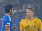 Washington Sundar and David Miller swap words.