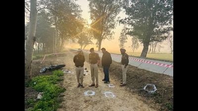 Police officials inspecting the encounter site in Naushehra Pannuan village, Tarn Taran, on Sunday. Police officials inspecting the encounter site in Naushehra Pannuan village, Tarn Taran, on Sunday.