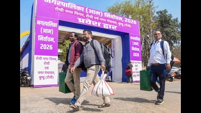 Polling staff carry ballot boxes and election materials amid preparations on the eve of voting in the Jharkhand municipal elections, in Ranchi, Sunday (PTI) Polling staff carry ballot boxes and election materials amid preparations on the eve of voting in the Jharkhand municipal elections, in Ranchi, Sunday (PTI)